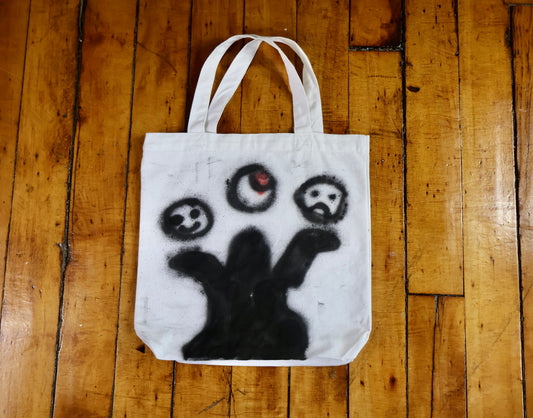FACE OFF TOTE BAG